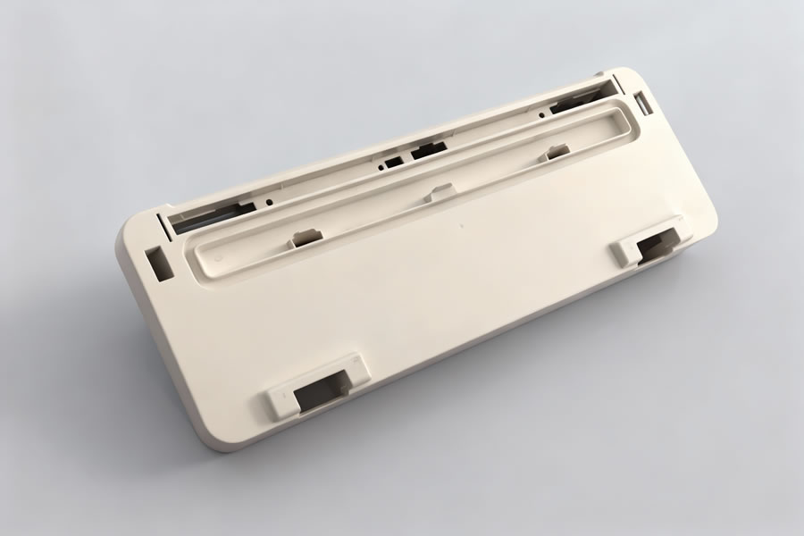 GP Mold: Injection molds for vacuum packaging machine parts, including top and bottom covers, buttons, and separator plates.  A precision mold manufacturer in China