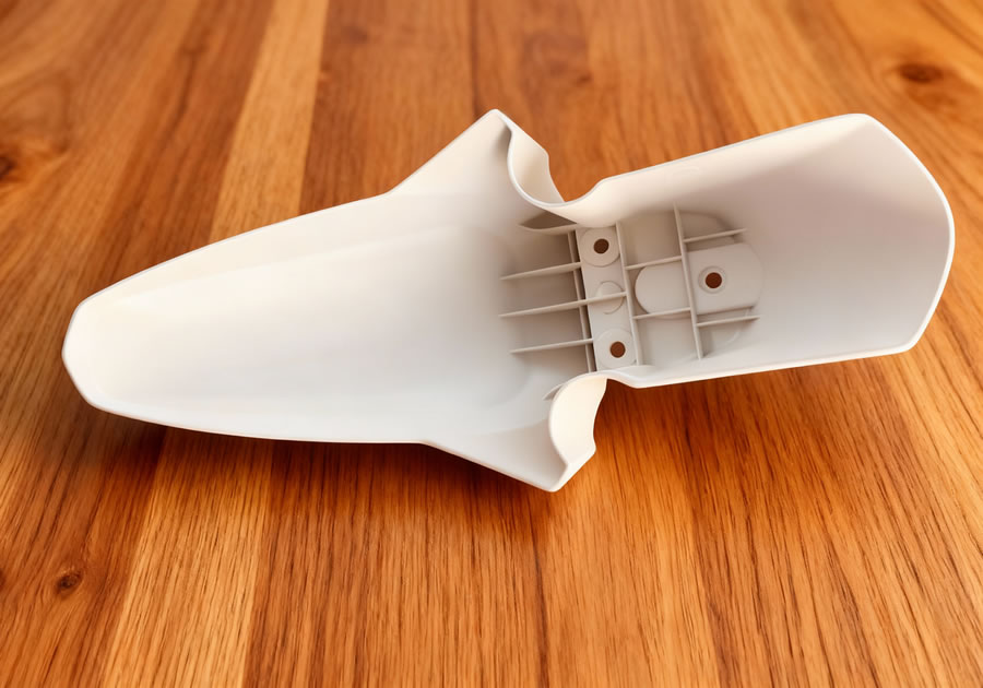 GP Mold: Motorcycle parts injection molds, including molds for helmets, goggles, license plate frames, fenders, and seats.  Chinese mold manufacturer, custom molds available